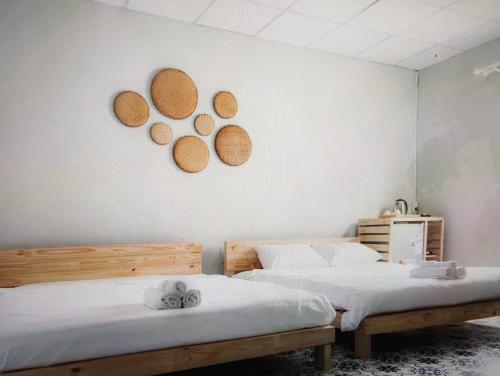 Ένα ή περισσότερα κρεβάτια σε δωμάτιο στο Ong 5 Homestay Can Tho