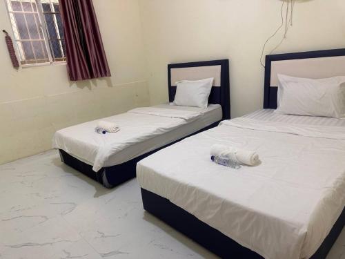 Postel nebo postele na pokoji v ubytování Lim Mohaleap Guest House