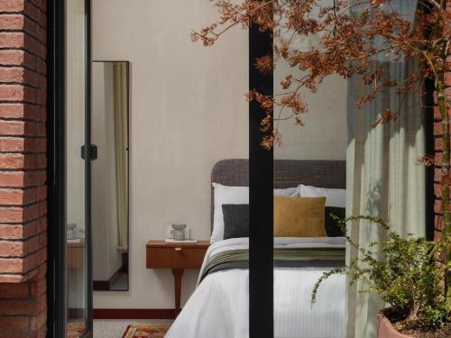 Postel nebo postele na pokoji v ubytování Apart-In Georgia