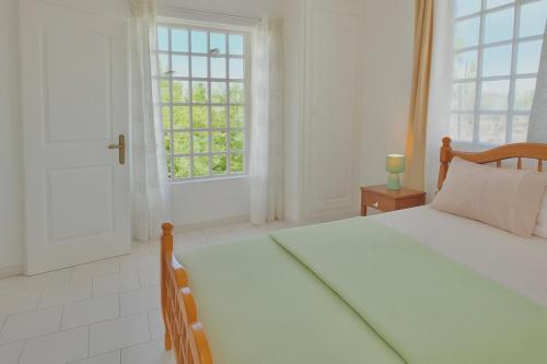 Ένα ή περισσότερα κρεβάτια σε δωμάτιο στο Villa Hacienda - Sweetness of living in Grand Gaube