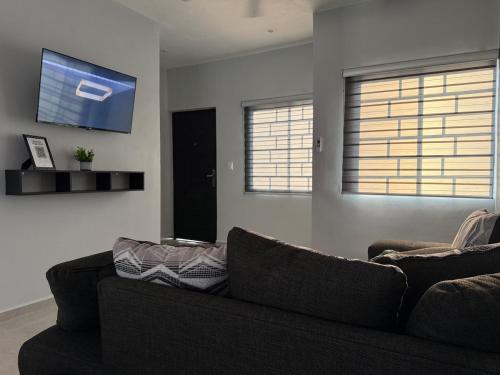 Μια τηλεόραση ή/και κέντρο ψυχαγωγίας στο Casa La Amistad Comoda Casa con 3 Habitaciones