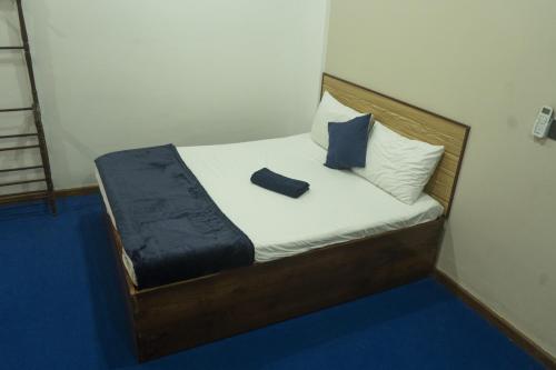 Ένα ή περισσότερα κρεβάτια σε δωμάτιο στο Manaal Palace