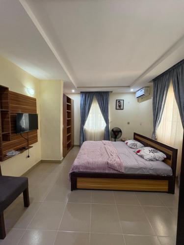 Postel nebo postele na pokoji v ubytování Bollington Adex house