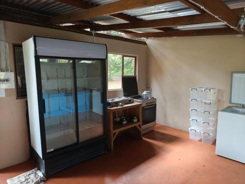 a room with a desk with a computer in it at Amangwane Tented Camp in Enkovukeni