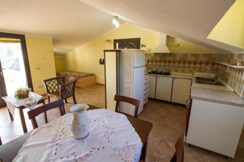 Dapur atau dapur kecil di Attico Bella Vista