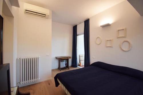 Ένα ή περισσότερα κρεβάτια σε δωμάτιο στο Suite&Breakfast La Veranda Di Fiesole