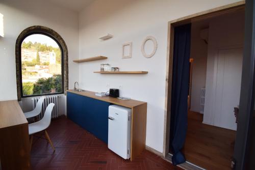 Η κουζίνα ή μικρή κουζίνα στο Suite&Breakfast La Veranda Di Fiesole
