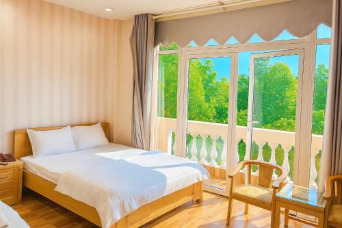 Ένα ή περισσότερα κρεβάτια σε δωμάτιο στο Phố Mới