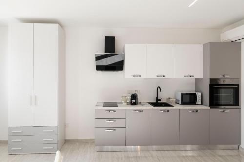 Η κουζίνα ή μικρή κουζίνα στο Casa Gialla - Appartamento Sole