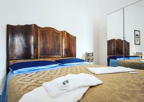 En eller flere senge i et værelse på Municipio 25