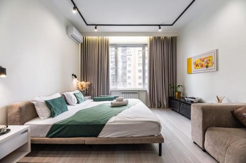 Postel nebo postele na pokoji v ubytování 8 Luxury Suites by MEGA Mall