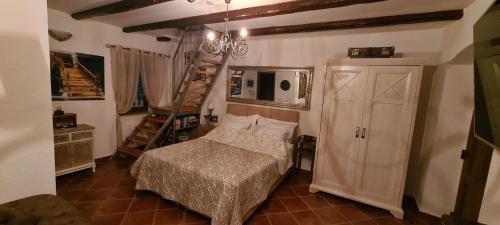 a bedroom with a bed and a ladder in a room at Villa Marella in Trogir