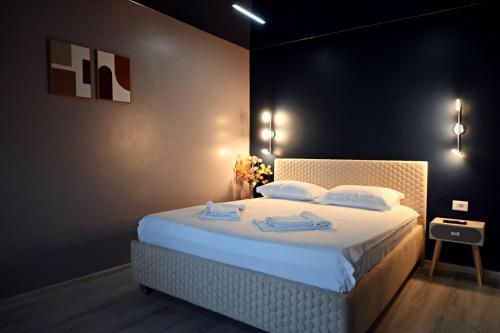 Postel nebo postele na pokoji v ubytování Eve's Central