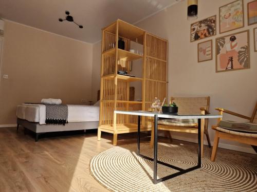 Ένα ή περισσότερα κρεβάτια σε δωμάτιο στο The Secret Garden – Keszthely