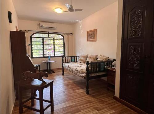 Postel nebo postele na pokoji v ubytování Paradise Garden watamu