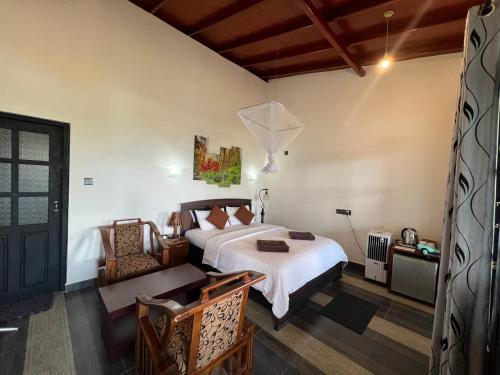 Postel nebo postele na pokoji v ubytování Blooming Rose Ella