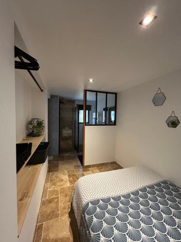 Postel nebo postele na pokoji v ubytování L Appart