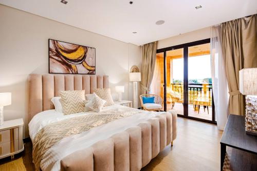 Ένα ή περισσότερα κρεβάτια σε δωμάτιο στο Anantara the palm Dubai Lagoon Beach Access