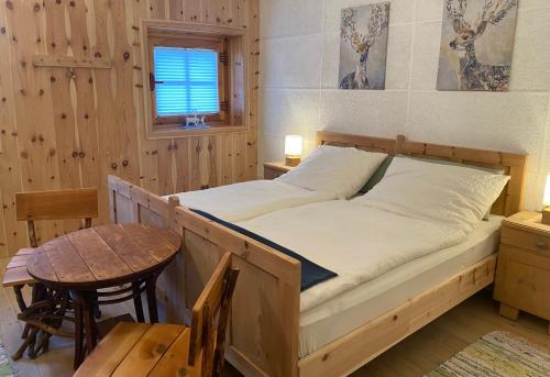 Ένα ή περισσότερα κρεβάτια σε δωμάτιο στο Lammerergut