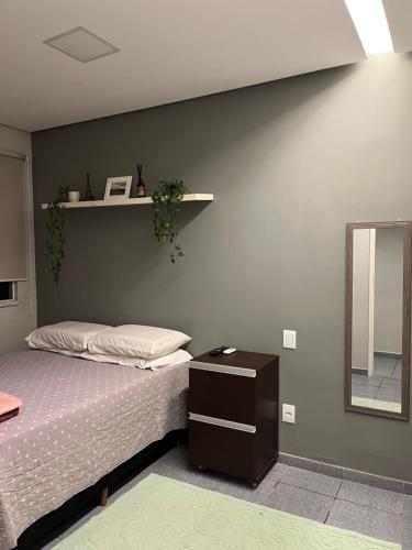 Giường trong phòng chung tại Casa aconchegante em Aracaju na Aruana