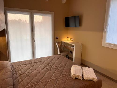 Ένα ή περισσότερα κρεβάτια σε δωμάτιο στο RiVaLoVE