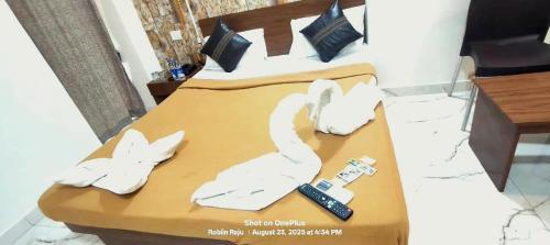 Postel nebo postele na pokoji v ubytování Hotel Red Rose