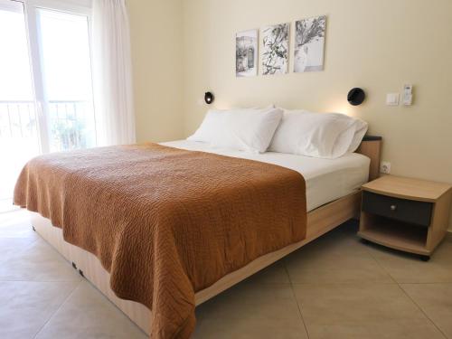 Postel nebo postele na pokoji v ubytování Canary Studios