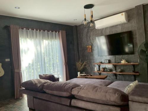 Posezení v ubytování Serenity House khlongnin