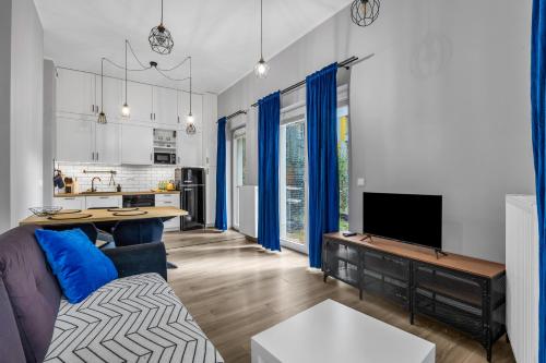 Wola Industrial Apartment by BookingHost