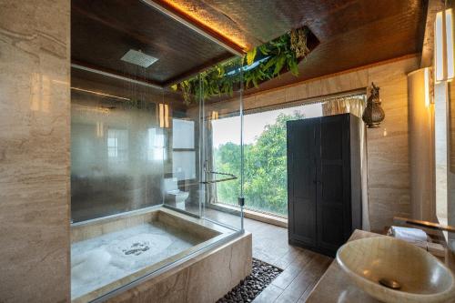 Koupelna v ubytování Anchaviyo Resort By Zuper