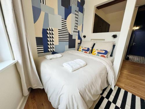 Postel nebo postele na pokoji v ubytování Best Place - Studio hyper centre ville d'Arras