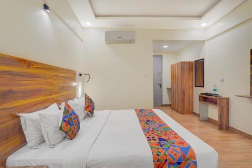 Ένα ή περισσότερα κρεβάτια σε δωμάτιο στο FabHotel East Land