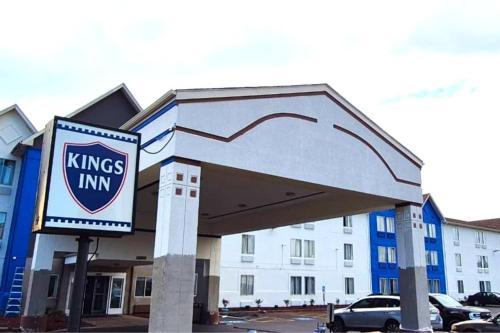 a kings inn sign in front of a building at Kings Inn By OYO Calumet Park I-57 in Calumet Park