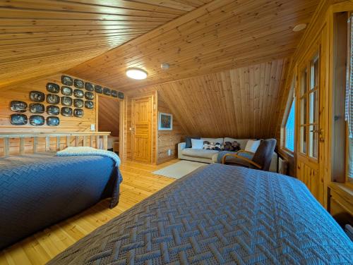 Postel nebo postele na pokoji v ubytování Nunnula