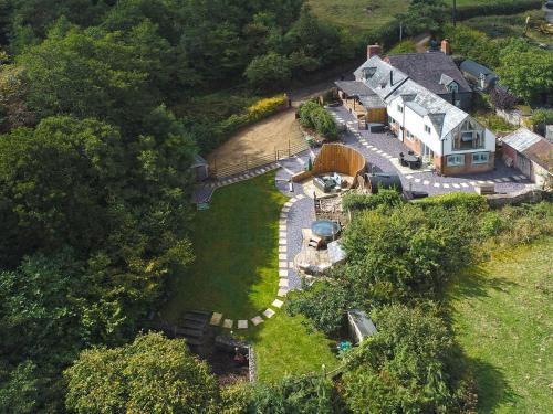an aerial view of a house on a hill at Private Lodge with Spa and Sauna in Shrewsbury
