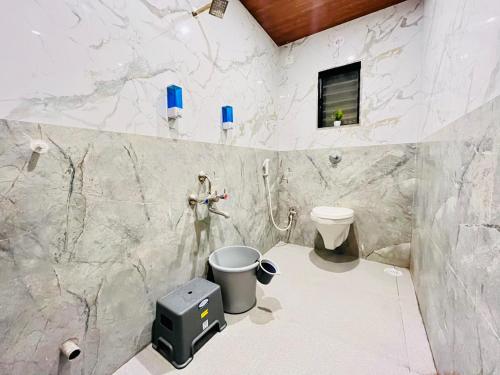 Ένα μπάνιο στο Hotel Sai 9 Heaven A Quality Apartment Perfect for Families