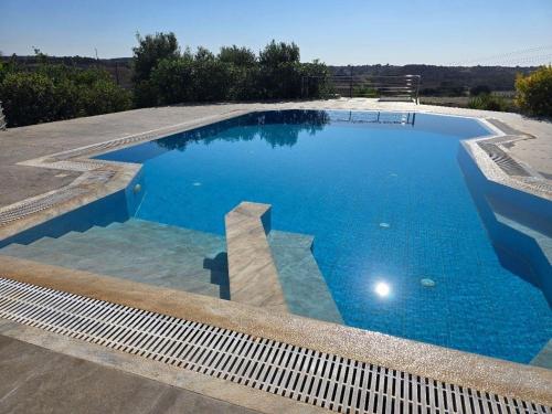 Πισίνα στο ή κοντά στο In 2015 fertiggestelltes Ferienhaus mit privatem Pool und Meerblick