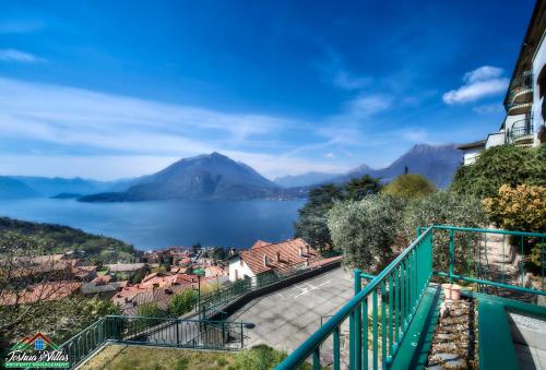 a view of the lake lucerne from a balcony at Sunset Apartment with Air Conditioning and Lake View in Perledo