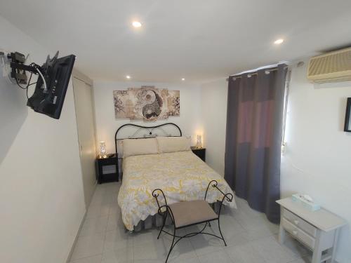 TV a/nebo společenská místnost v ubytování Casa Kalma