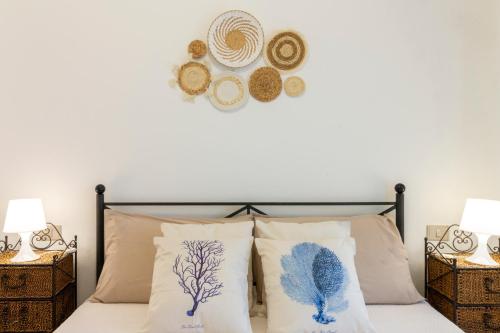 Ένα ή περισσότερα κρεβάτια σε δωμάτιο στο 600m from the beach - Garden and Sea View