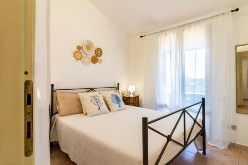 Ένα ή περισσότερα κρεβάτια σε δωμάτιο στο 600m from the beach - Garden and Sea View