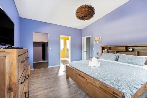 Ένα ή περισσότερα κρεβάτια σε δωμάτιο στο Perry's Place