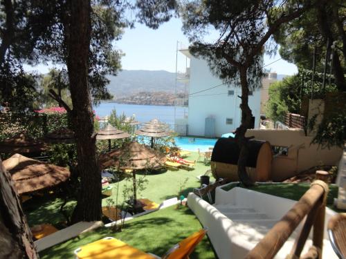 a view of the pool from the balcony of a resort at New Aegli Resort Hotel in Poros