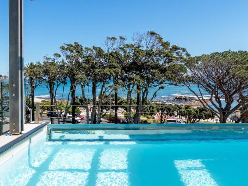 Blue Views Penthouse Beachfront Apartment with Pool