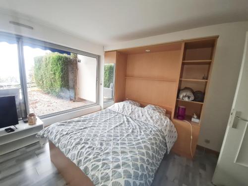 Postel nebo postele na pokoji v ubytování Au dessus des nuages Sublime Vue