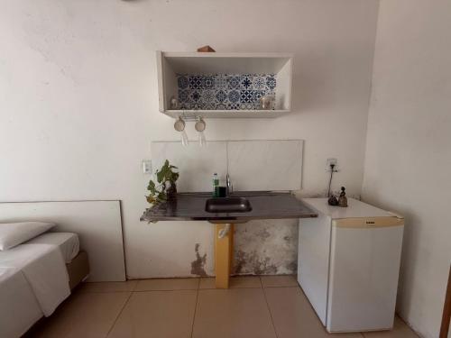 Η κουζίνα ή μικρή κουζίνα στο Caminito Brasília Hostel