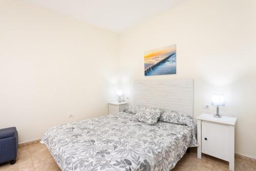 Postel nebo postele na pokoji v ubytování Home2Book Warm Family Stay Güimar
