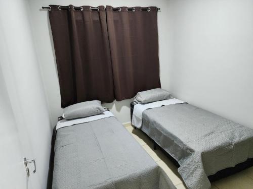 Uma cama ou camas num quarto em Comfortable house in a gated community