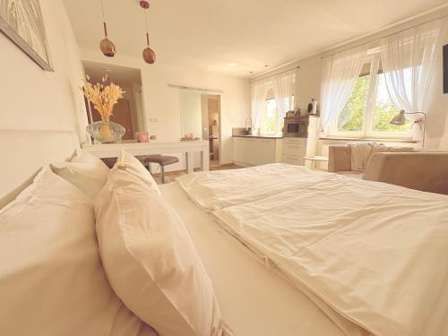 Postel nebo postele na pokoji v ubytování Trio Apartments