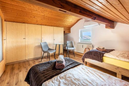 Ένα ή περισσότερα κρεβάτια σε δωμάτιο στο Haus Harmonie